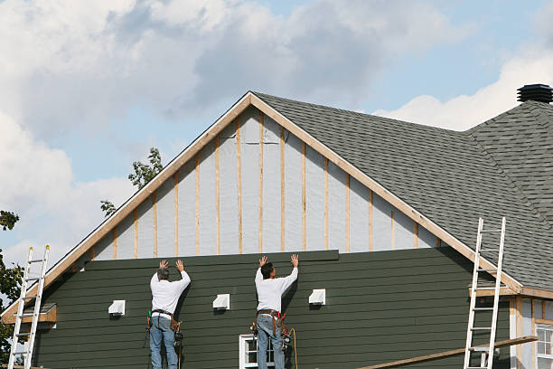 Professional Siding Installation technician working in McKinney, TX
